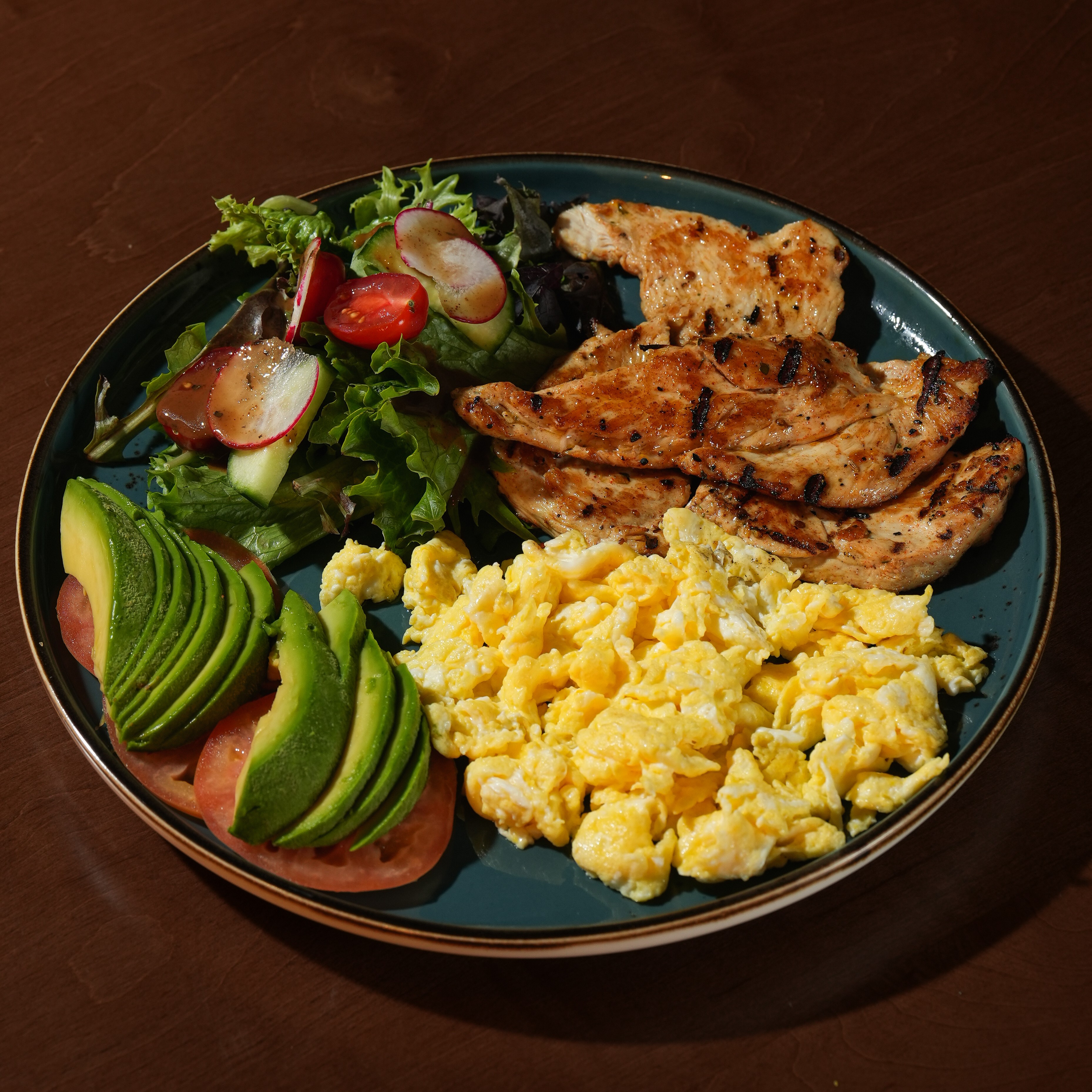 Protein Breakfast — Three eggs with grilled chicken breast or smoked salmon, fresh tomato, avocado, house salad, and toast. — Brunch Favourites at SOLENA Brunch & Bar in Corso Italia, Toronto