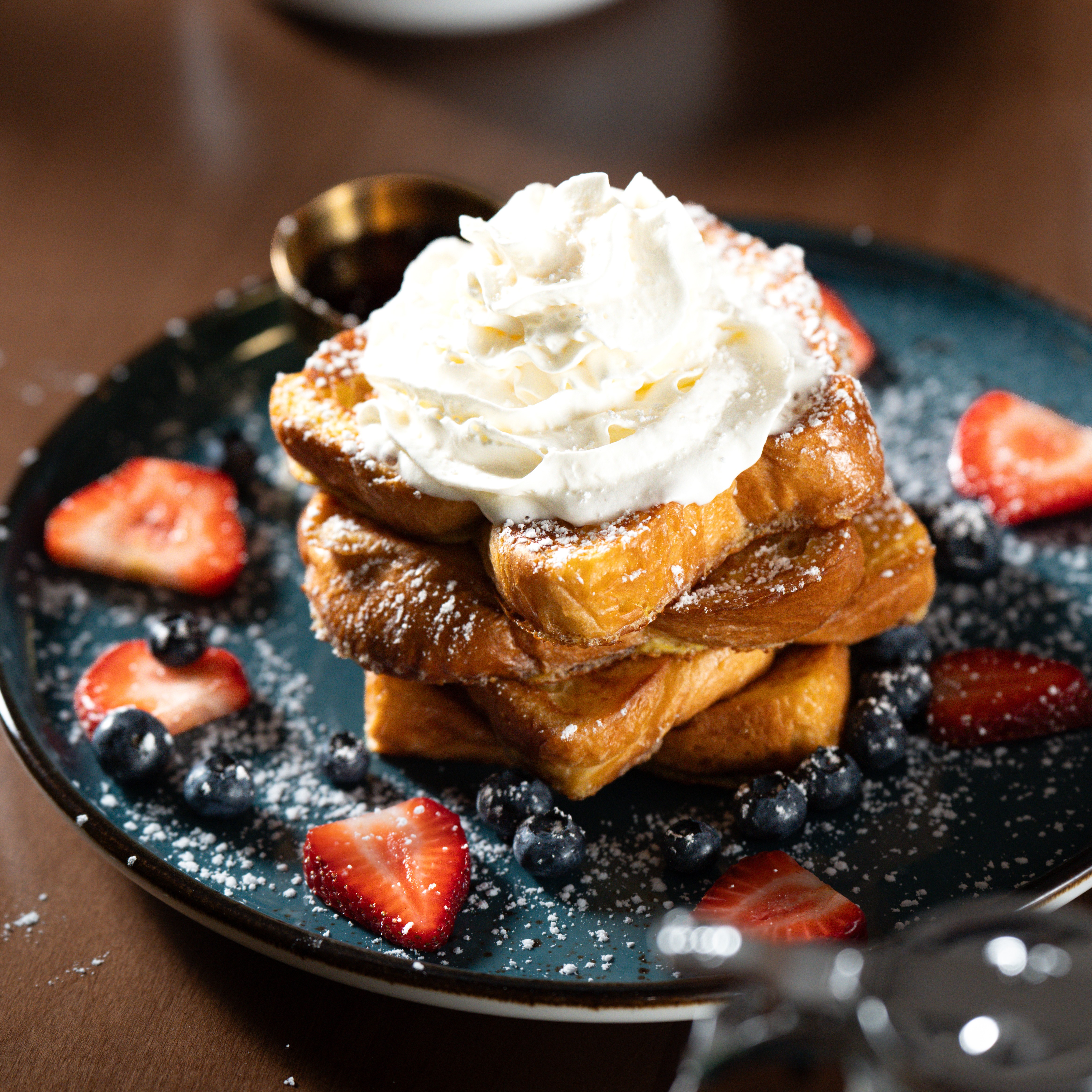 Maple French Toast — Golden French toast, fresh berries, whipped cream, and Canadian maple syrup. — Sweet Brunch at SOLENA Brunch & Bar in Corso Italia, Toronto